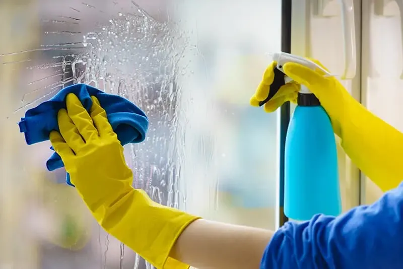 Clean interior glass and windows after a construction project